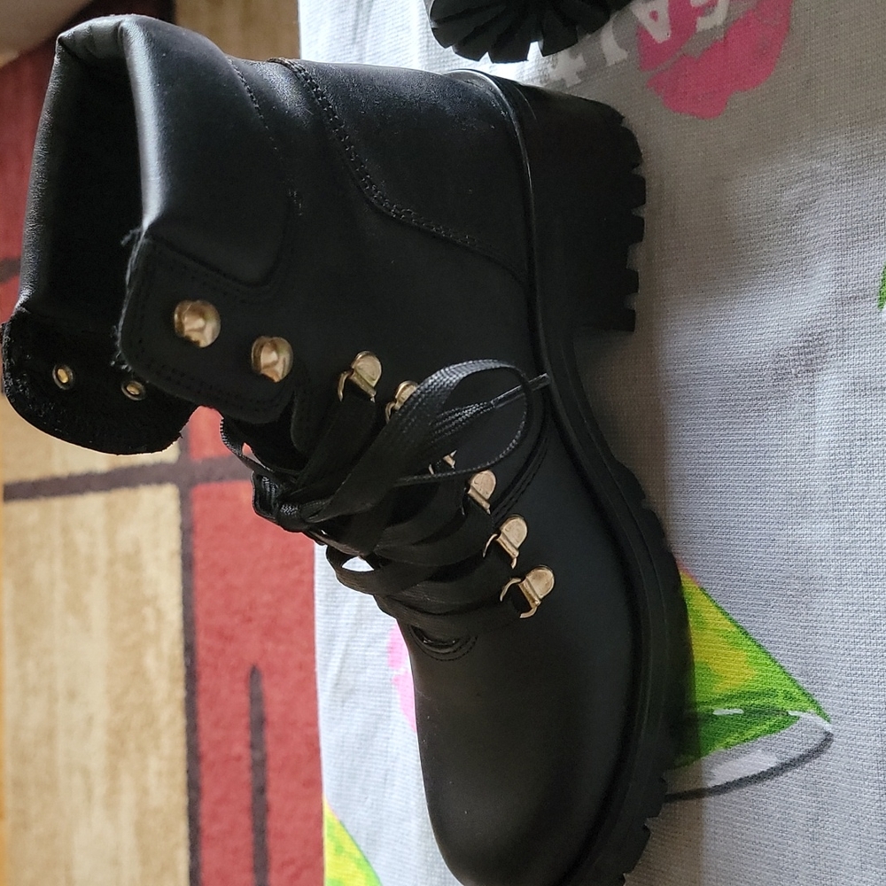 Steve Madden combat boot. Black, gold hooks also come with red shoes strings